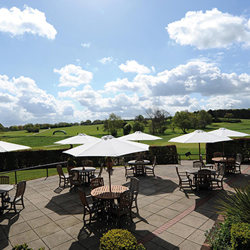 Outdoor seating overlooking the golf course