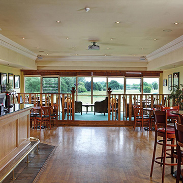 Grab a drink at the sports bar after a round of golf