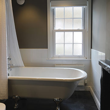 Bathroom with luxury roll top bath