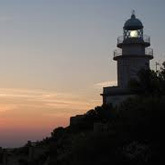 Travel to Cabo San Antonio to view the protected marine reserve and lighthouse