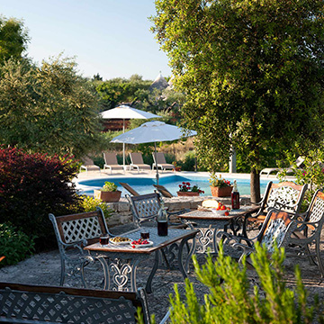 Outdoor seating perfect for al fresco dining by the pool