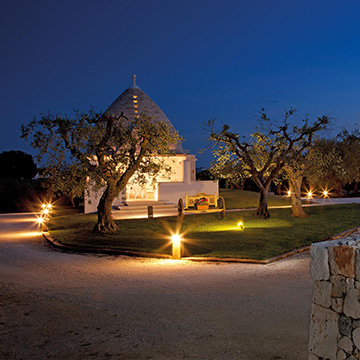 The villas illuminated at night