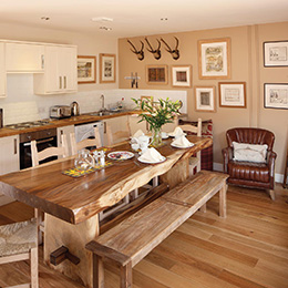 Stunning solid wood table in the dining area of Ghille's Bothy